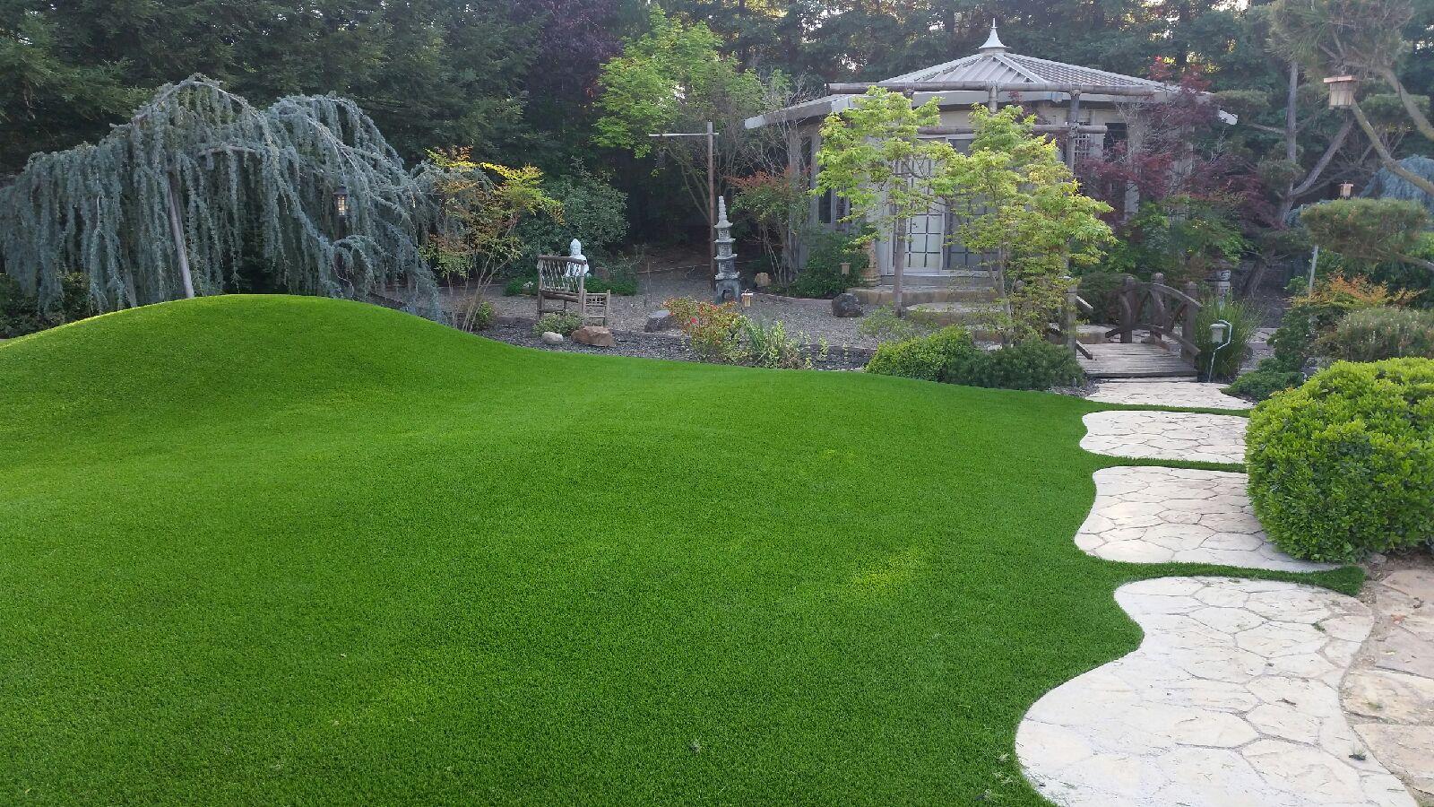 Seamless Landscape Designs with Artificial Grass